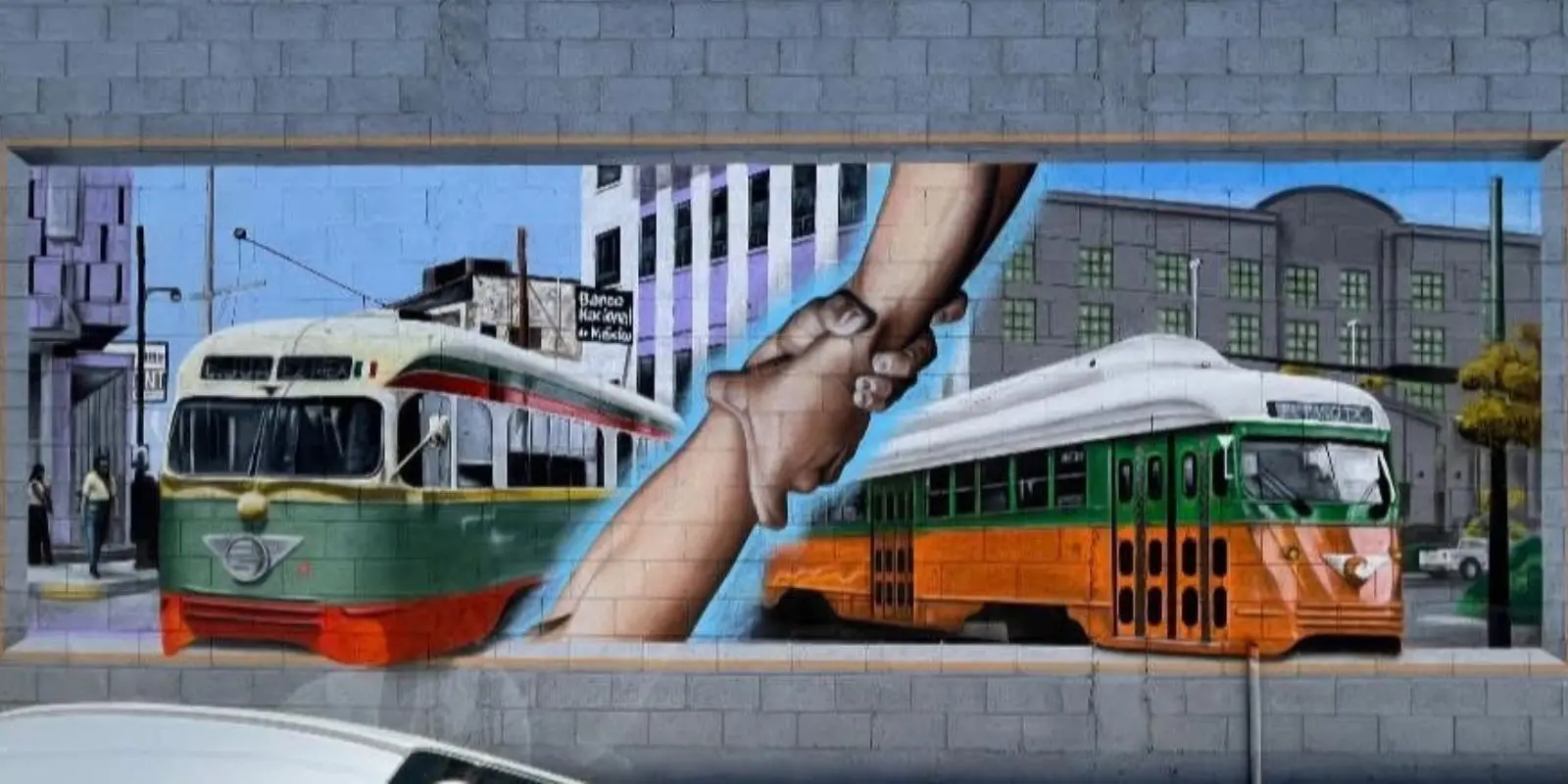 Arte que une ciudades: mural rinde tributo al tranvía binacional